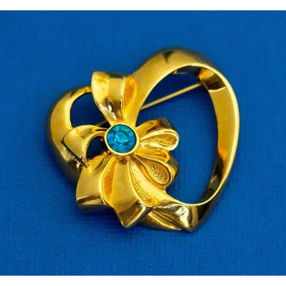 Vintage Gold Tone Diamond Gem Blue Rhinestone Ribbon Brooch by Avon D37 - Picture 1 of 2
